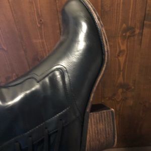 Torrid black tall boots with lace up back